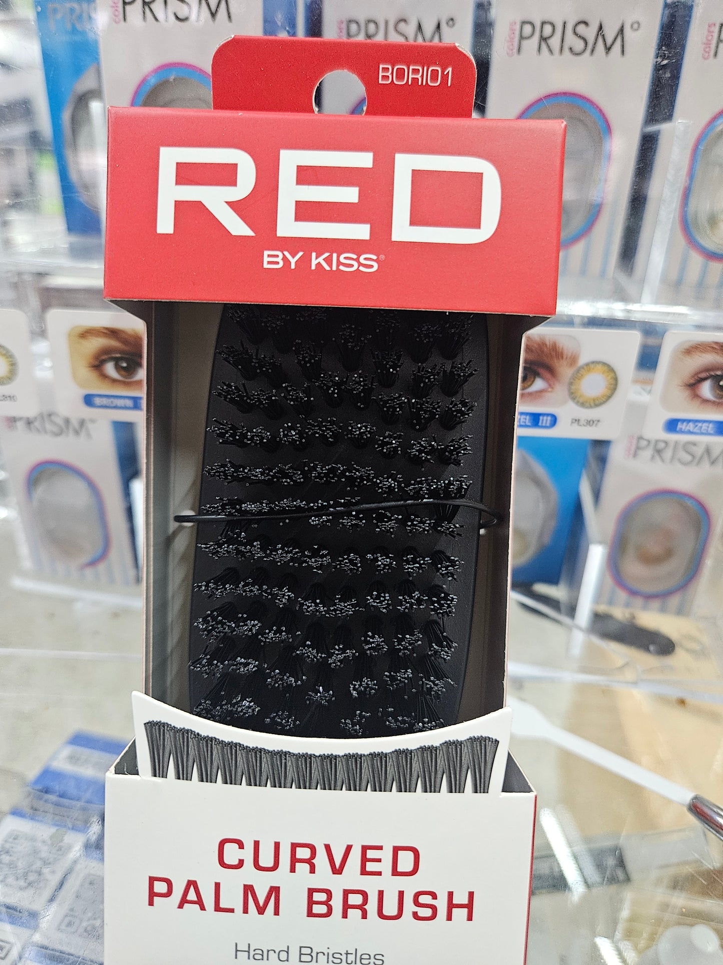 Red curved palm brush