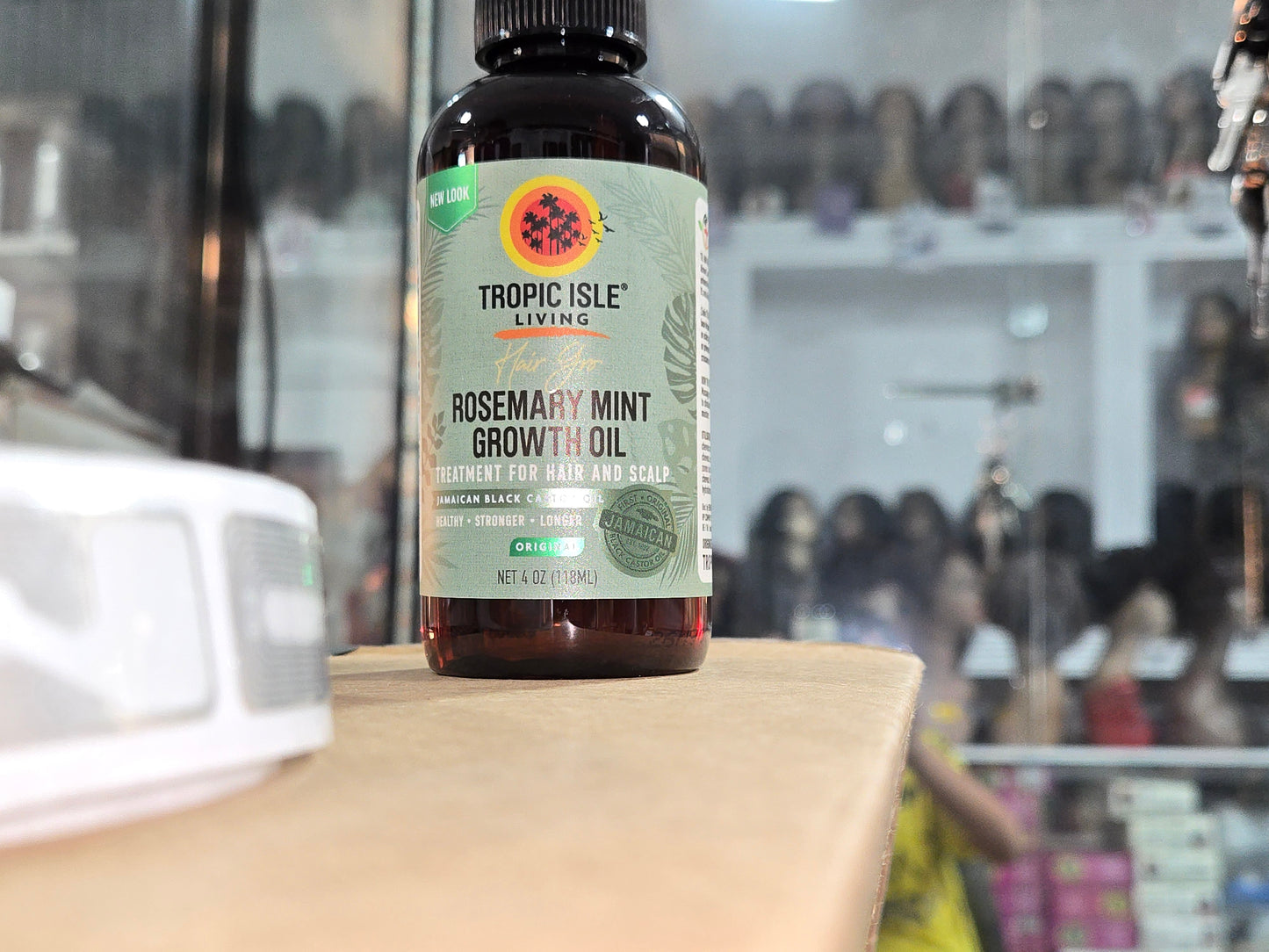 Tropical isle rosemary mint growth oil