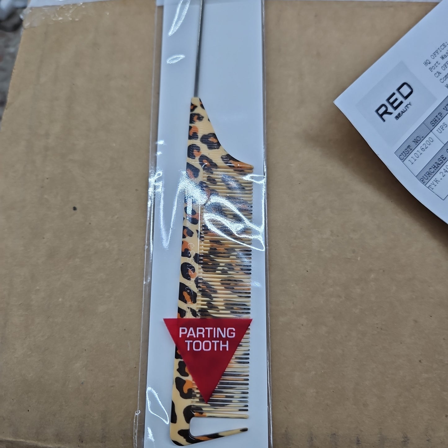 Red leopard parting comb