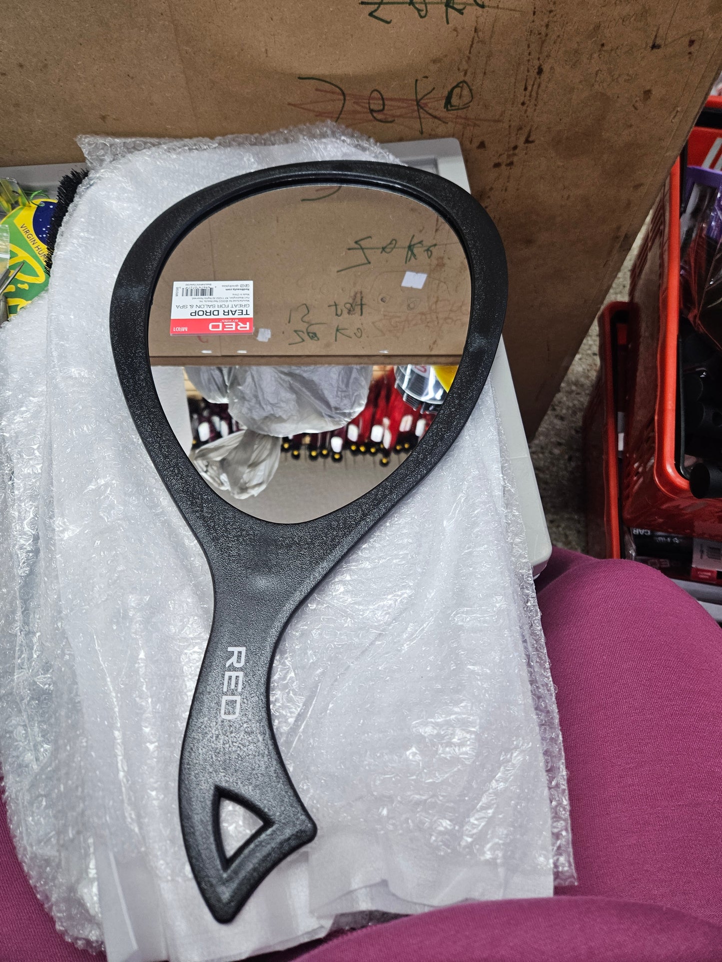 Red tear drop mirror
